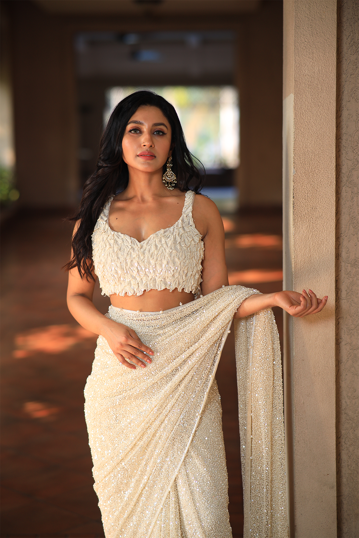 Off white net embroidered Saree with statement sleeveless blouse