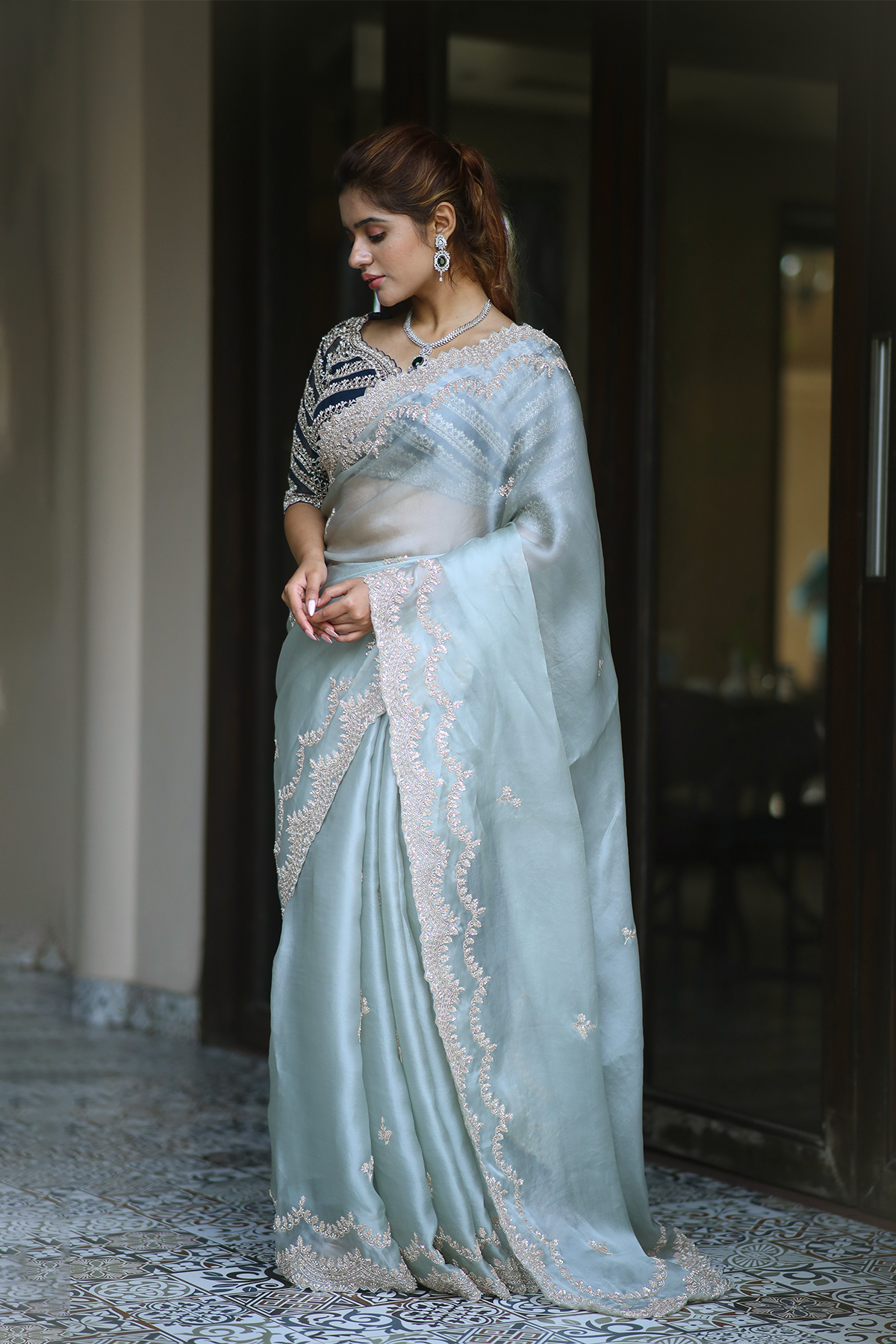 Powder blue silk organza embroidered Saree with elbow sleeve embroidered blouse