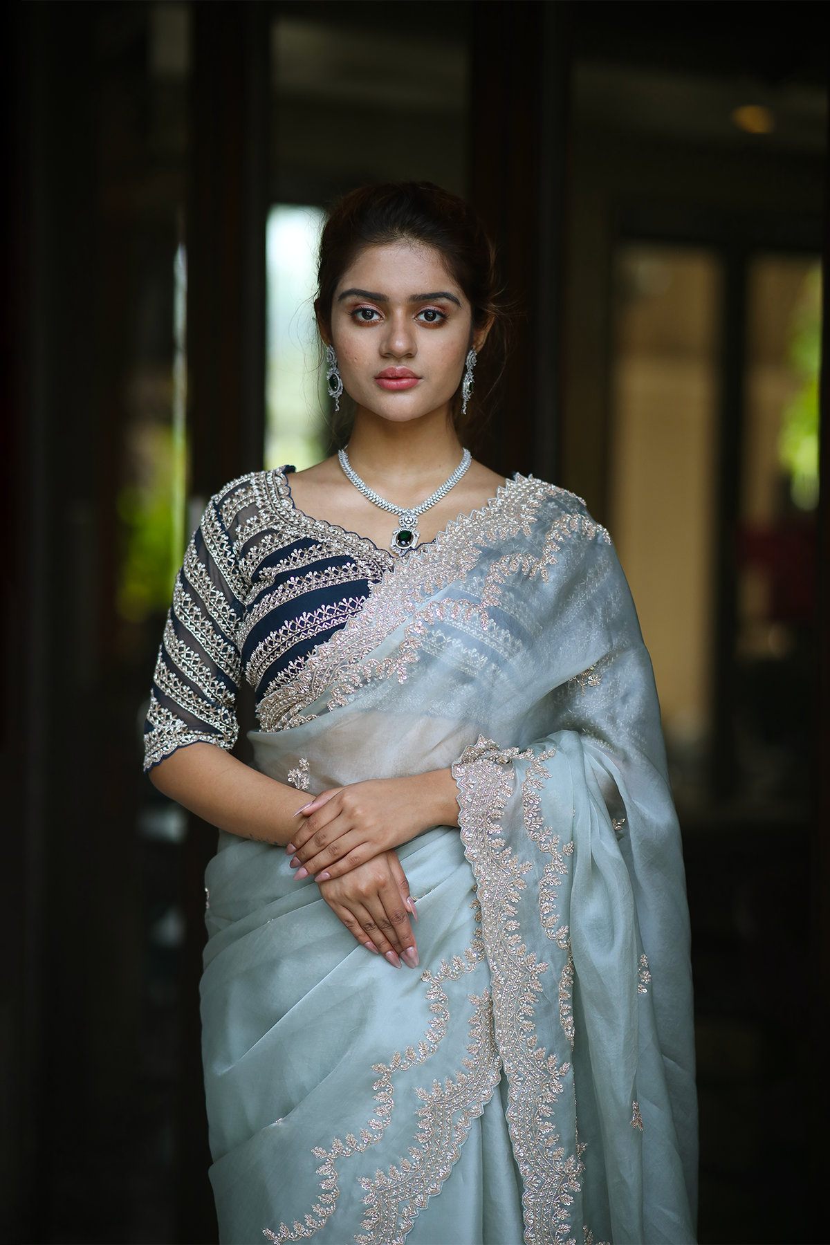 Powder blue silk organza embroidered Saree with elbow sleeve embroidered blouse