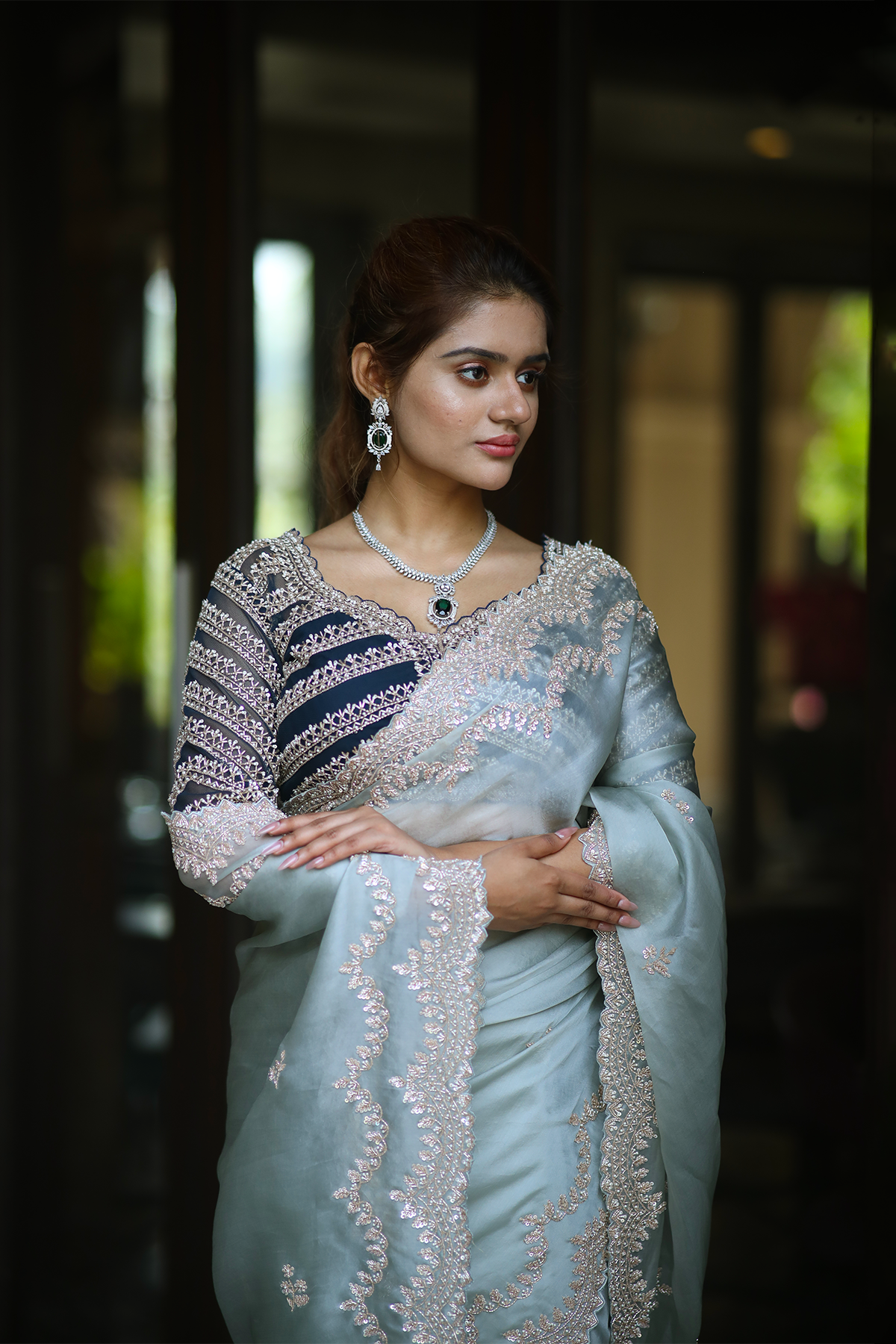 Powder blue silk organza embroidered Saree with elbow sleeve embroidered blouse