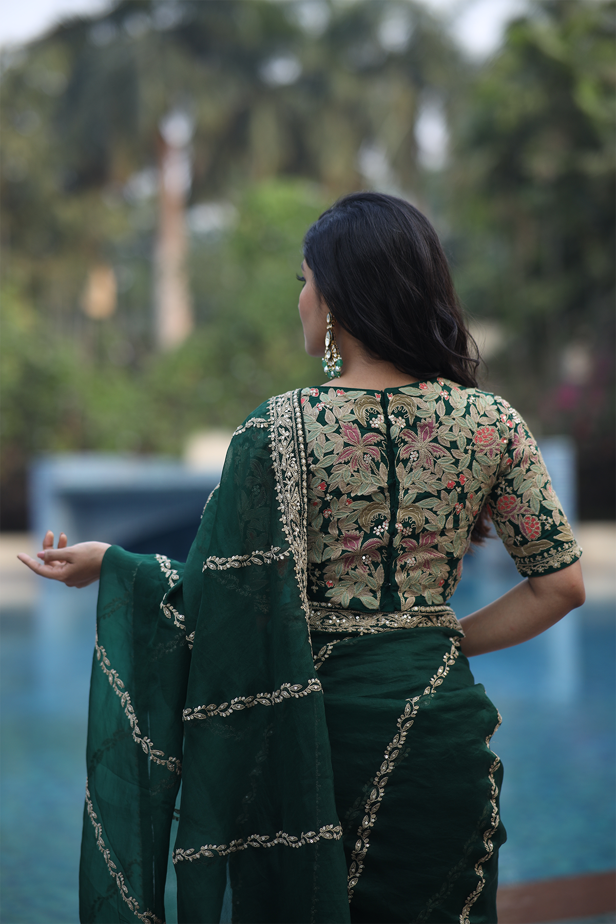 Green silk organza embroidered Saree with multi-color elbow sleeve blouse