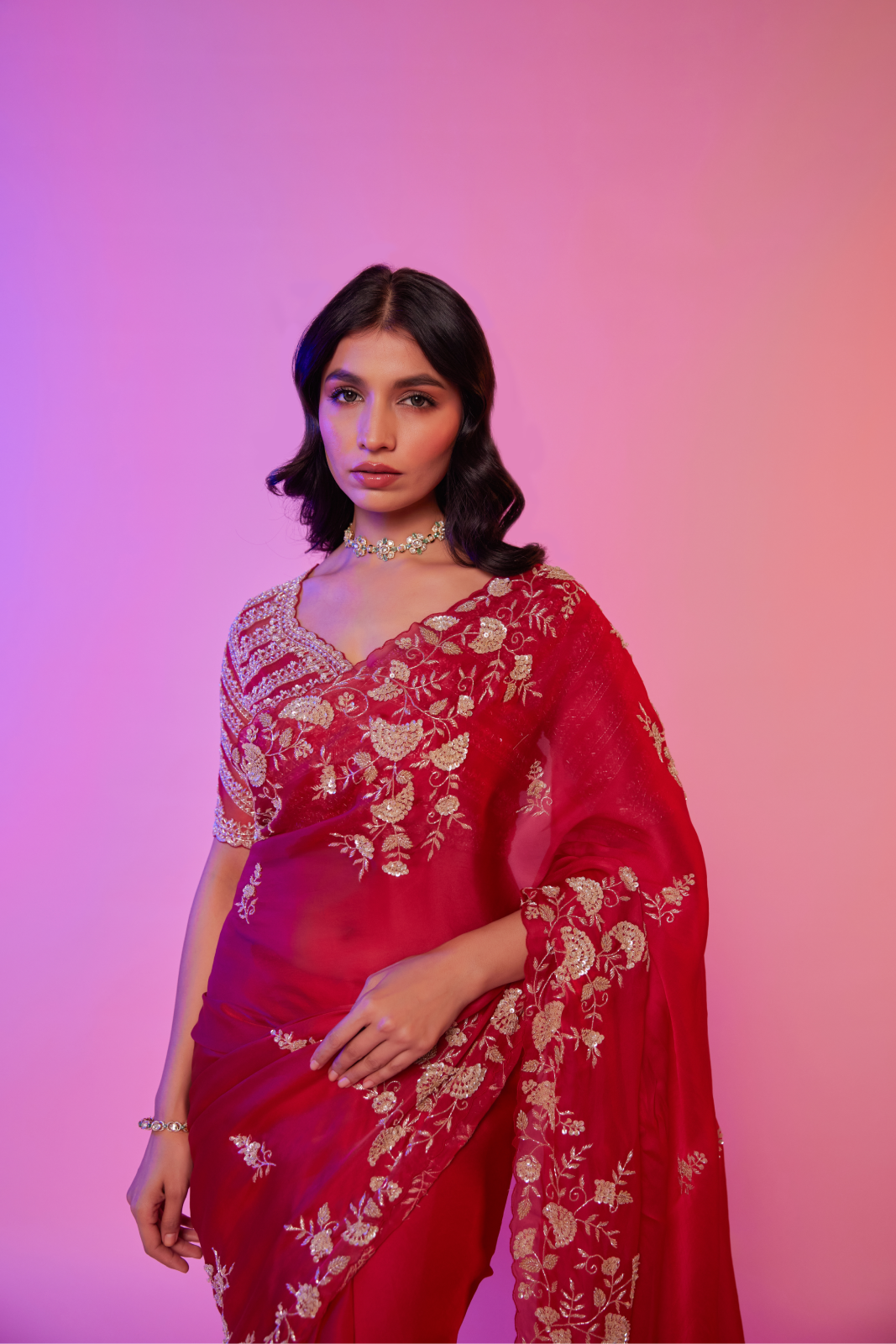 Rani pink silk organza embroidered Saree with elbow sleeve blouse
