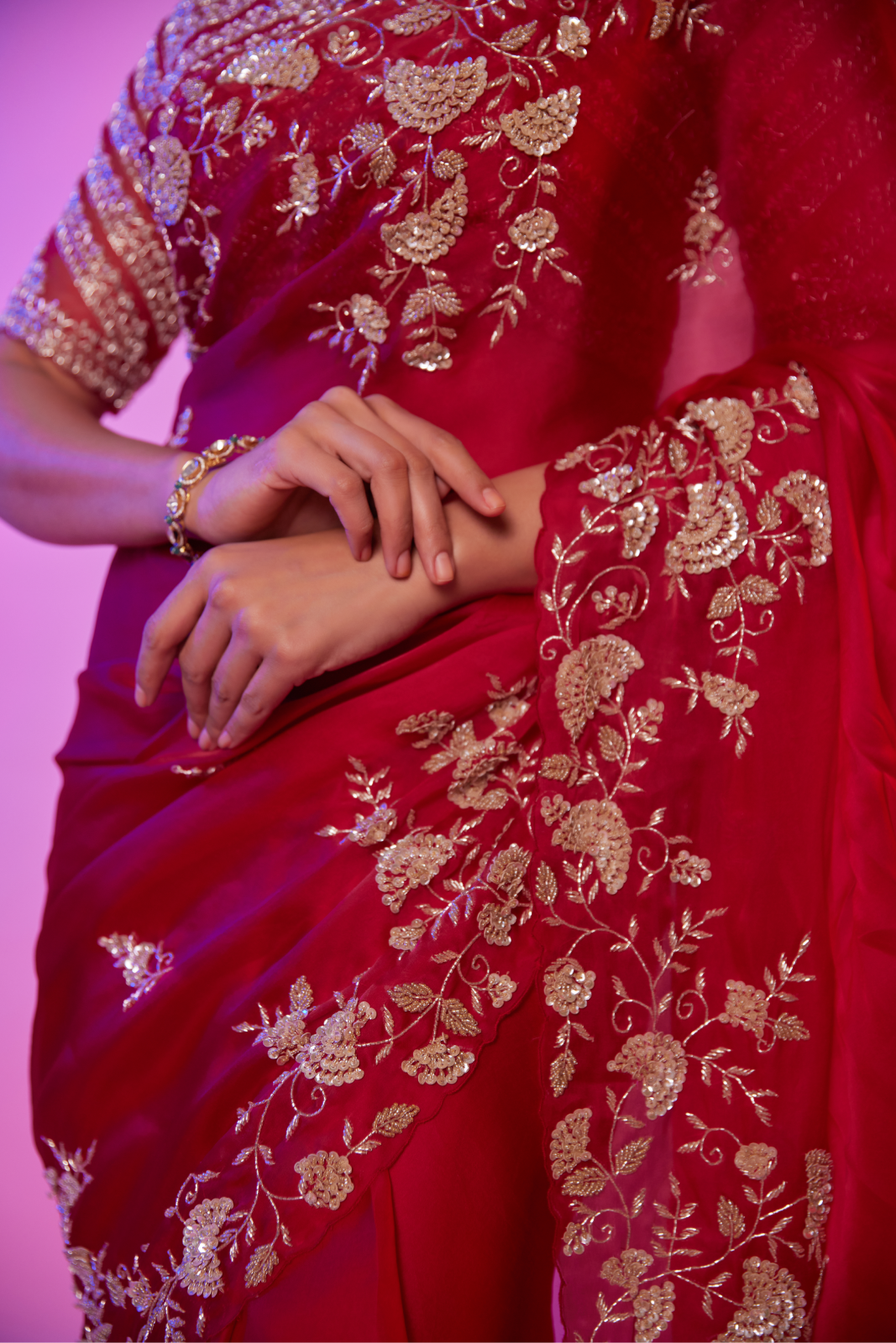 Rani pink silk organza embroidered Saree with elbow sleeve blouse