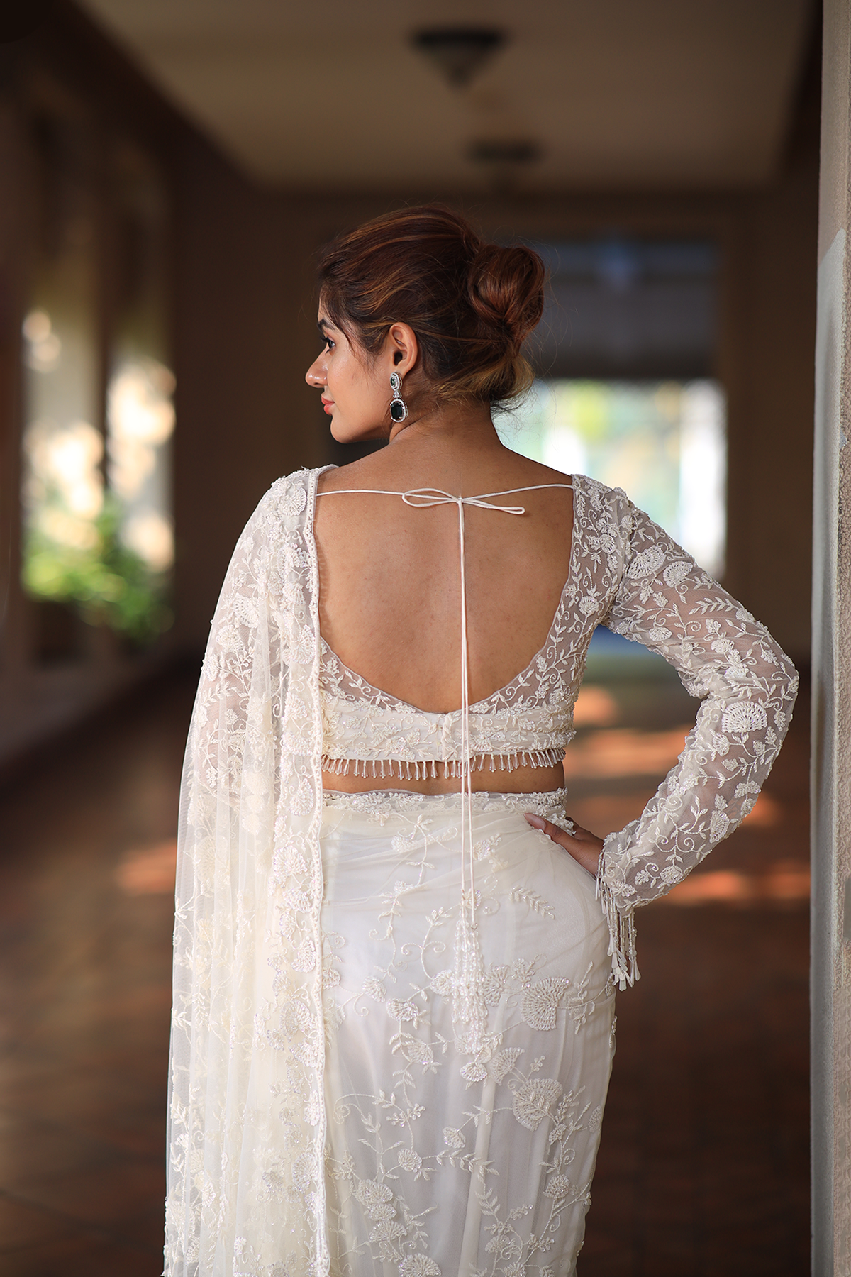 Off-white net embroidered Saree with full sleeve embroidered blouse