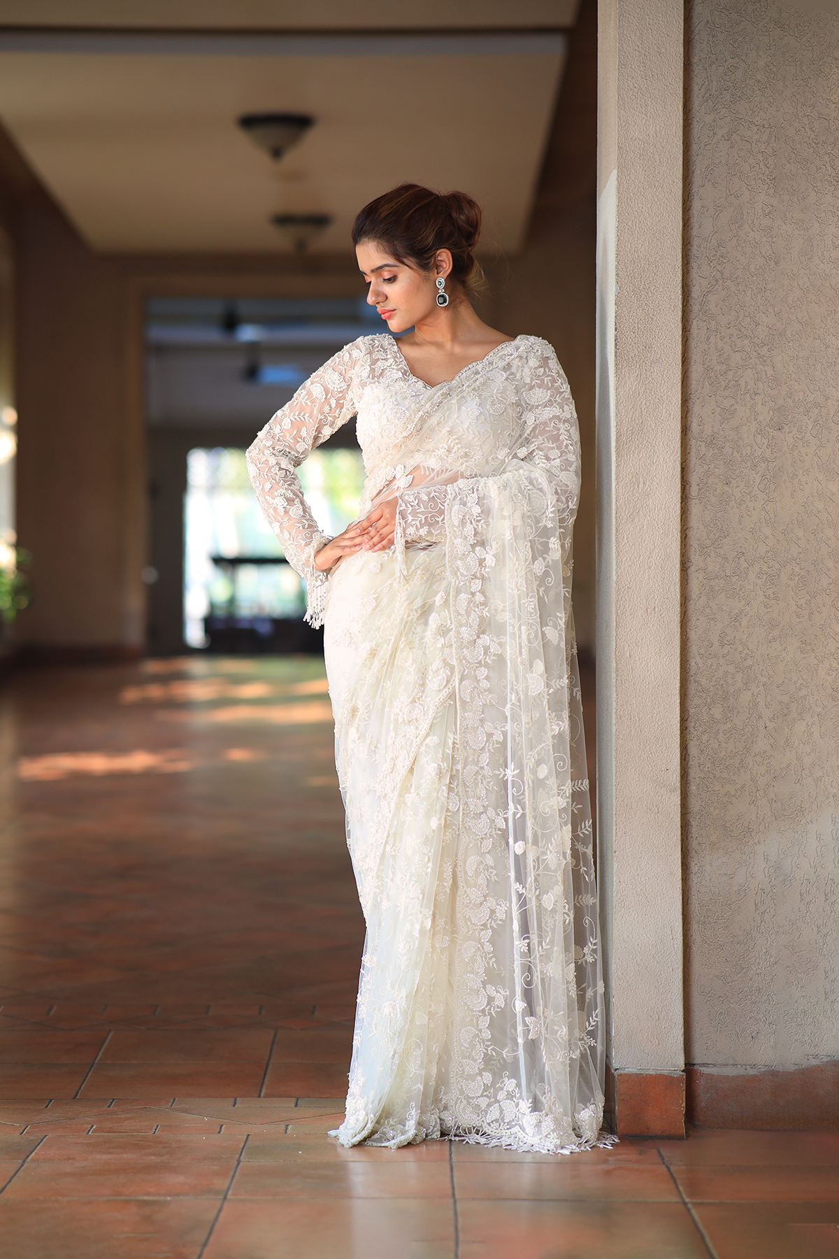 Off-white net embroidered Saree with full sleeve embroidered blouse
