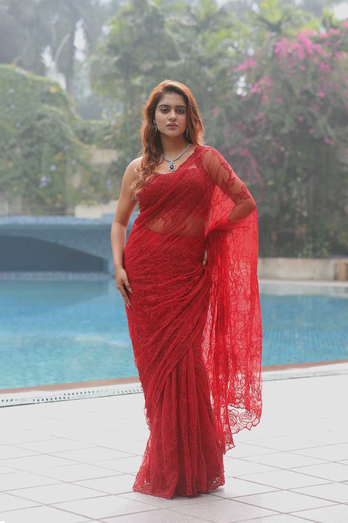 Red net floral applique embroidered Saree with sleeveless blouse