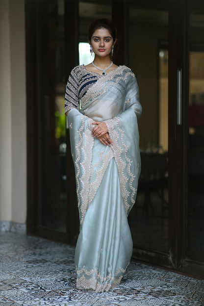 Powder blue silk organza embroidered Saree with elbow sleeve embroidered blouse