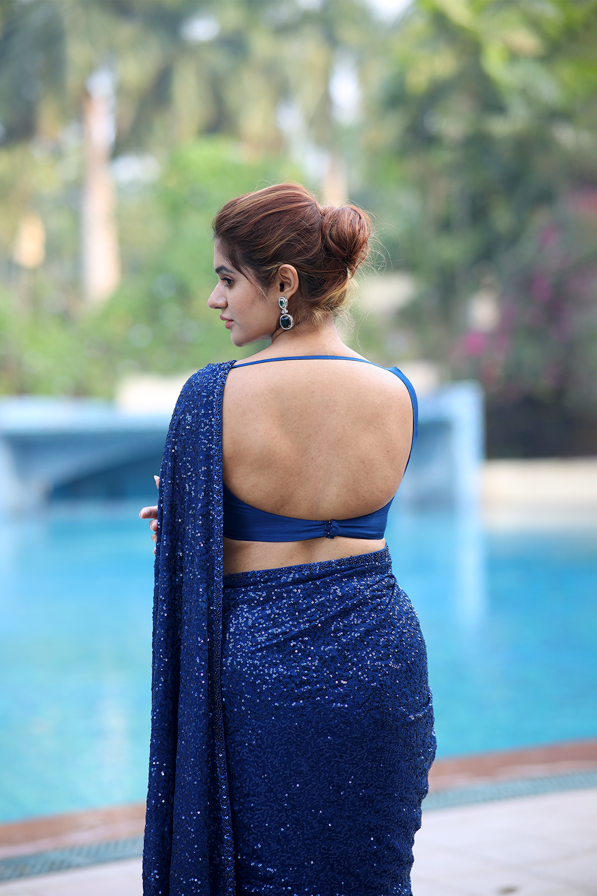 Ink blue chiffon embroidered Saree with sleeveless blouse