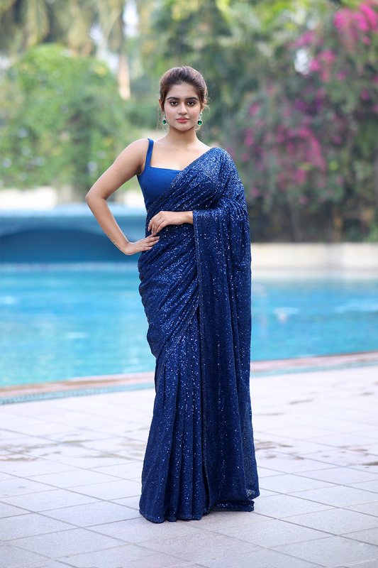 Ink blue chiffon embroidered Saree with sleeveless blouse