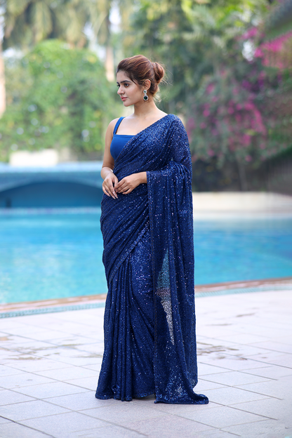 Ink blue chiffon embroidered Saree with sleeveless blouse