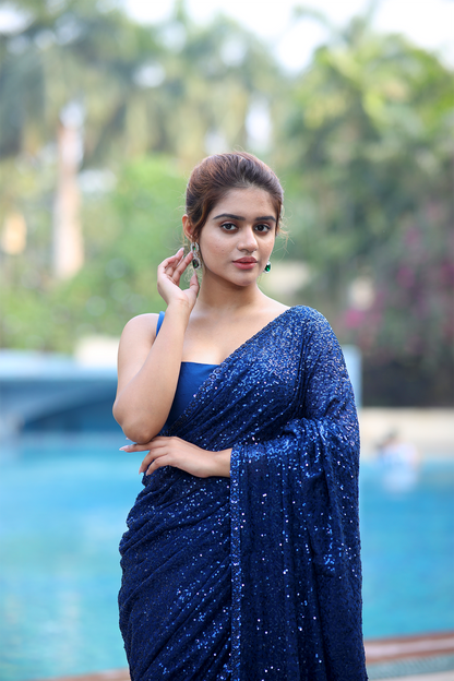 Ink blue chiffon embroidered Saree with sleeveless blouse