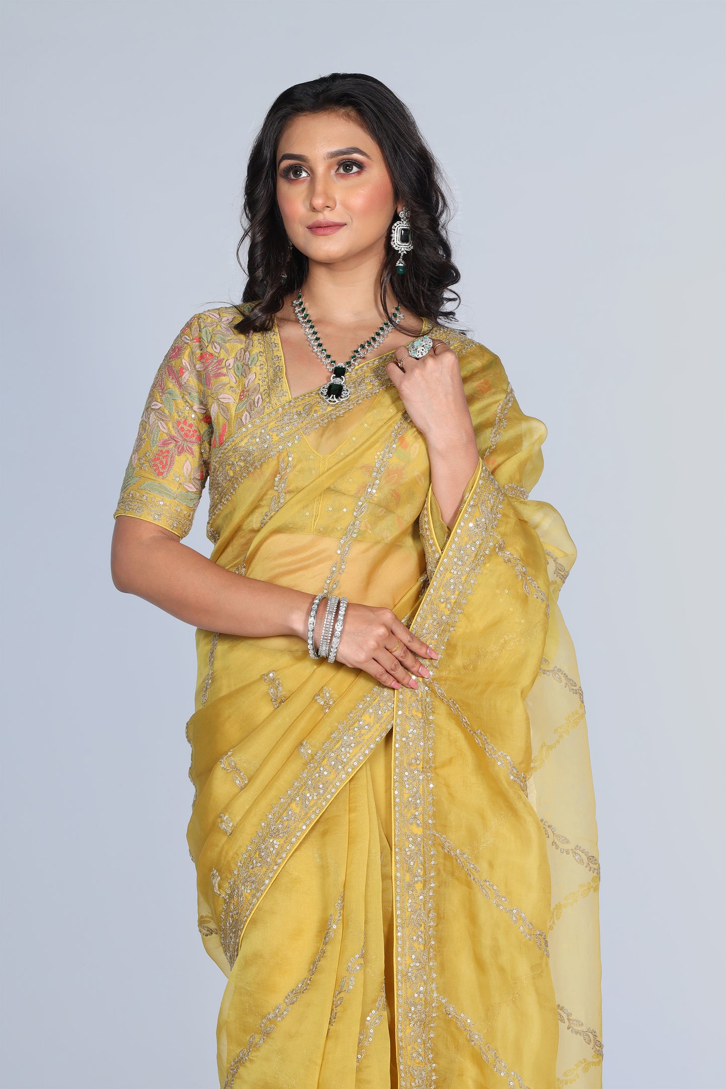 Yellow silk organza embroidered Saree with multi-color elbow sleeve blouse