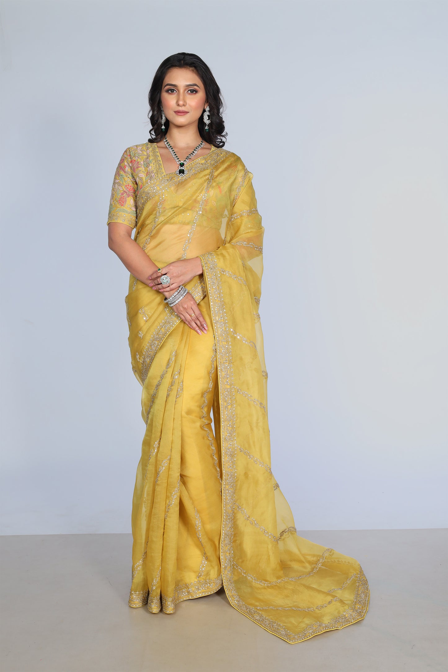 Yellow silk organza embroidered Saree with multi-color elbow sleeve blouse