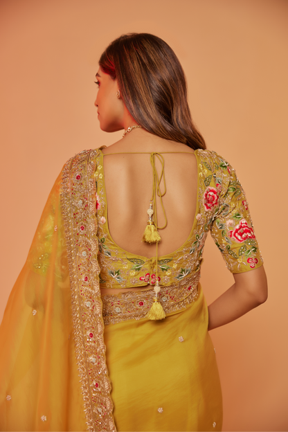 Yellow silk organza embroidered Saree with multi-color elbow sleeve blouse