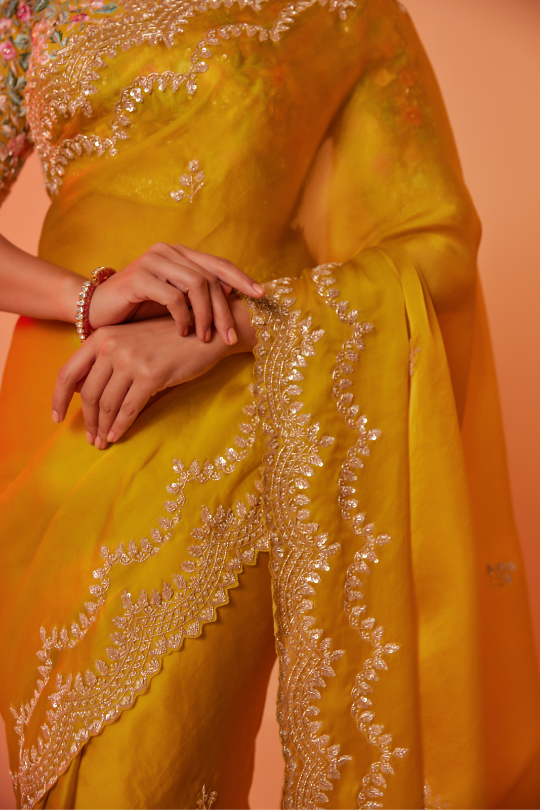 Yellow silk organza embroidered Saree with elbow sleeve multi-color thread blouse