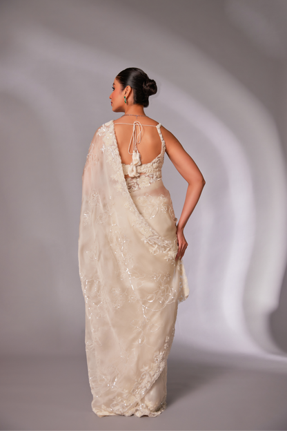 Off-white silk organza embroidered Saree with sleeveless blouse