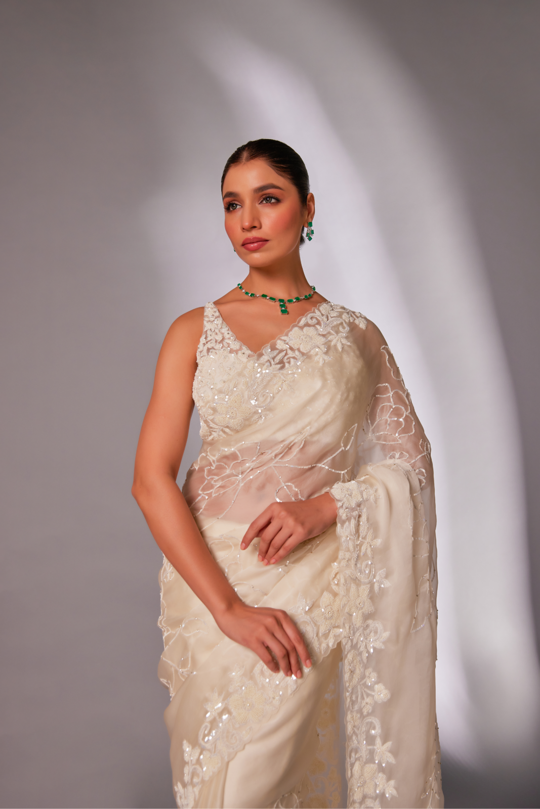 Off-white silk organza embroidered Saree with sleeveless blouse