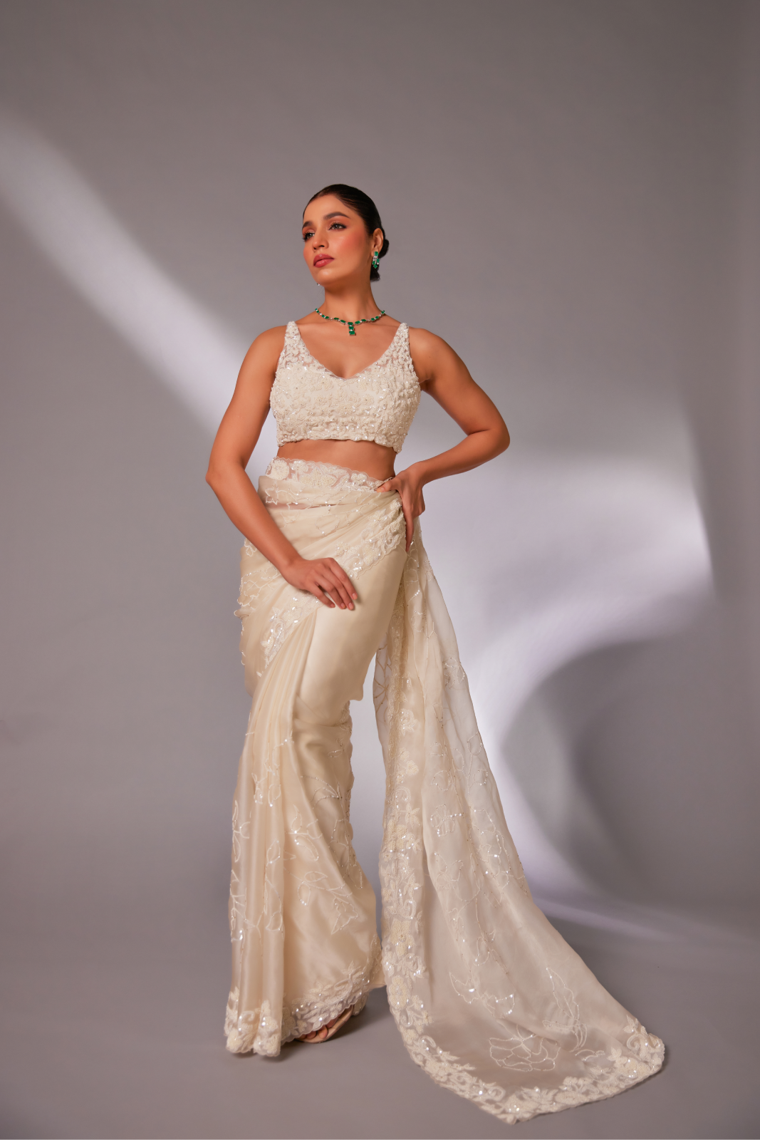 Off-white silk organza embroidered Saree with sleeveless blouse