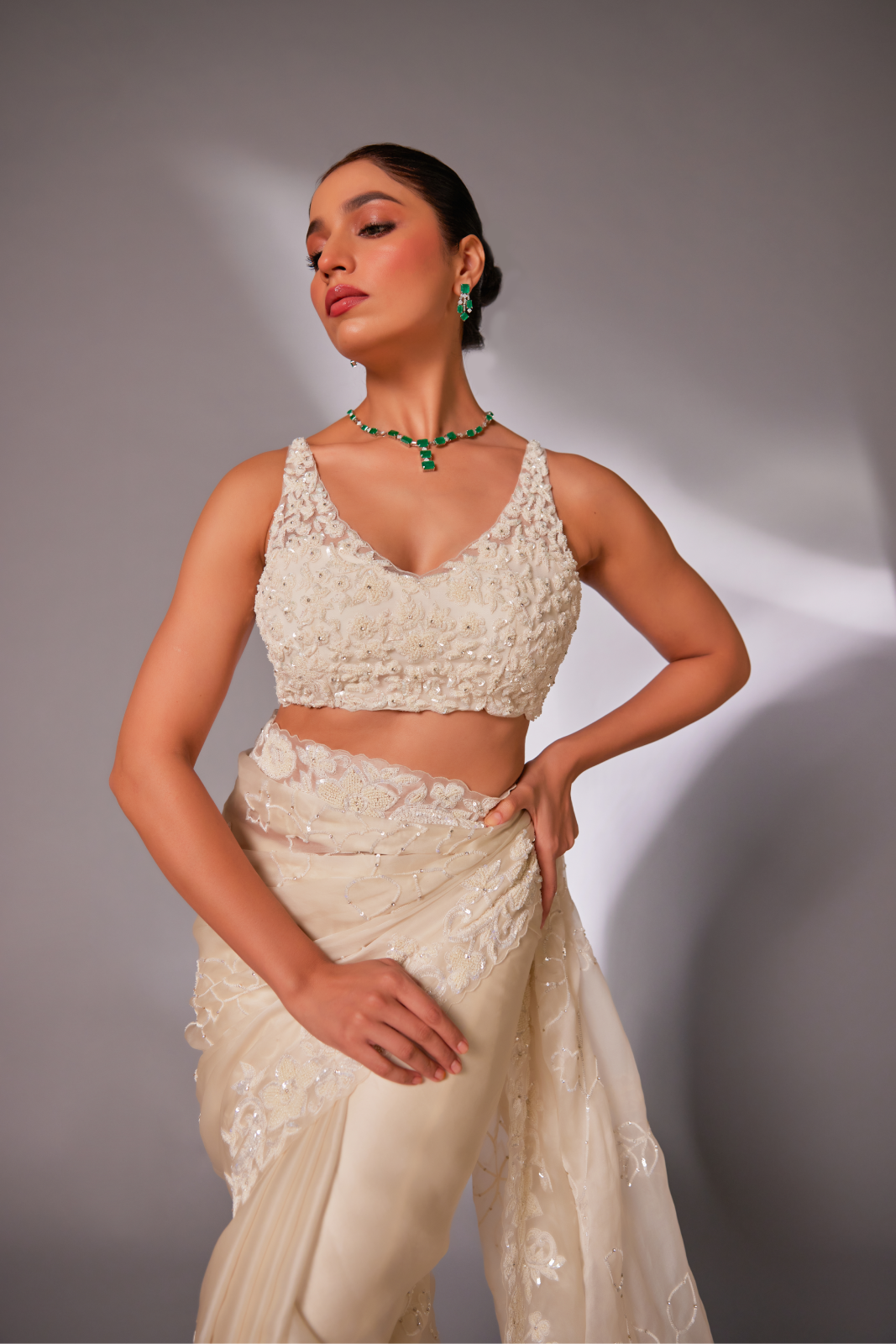 Off-white silk organza embroidered Saree with sleeveless blouse