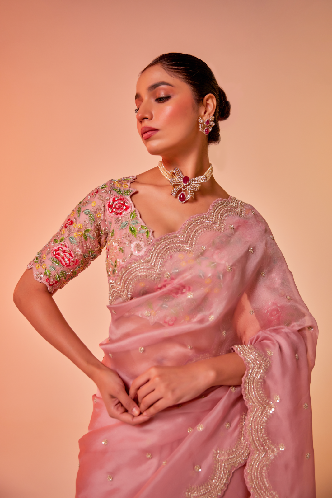 Pink silk organza embroidered Saree with multi-color elbow sleeve blouse