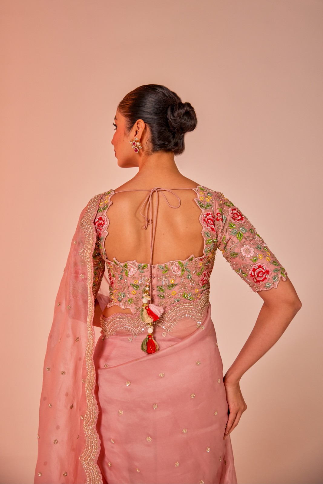 Pink silk organza embroidered Saree with multi-color elbow sleeve blouse