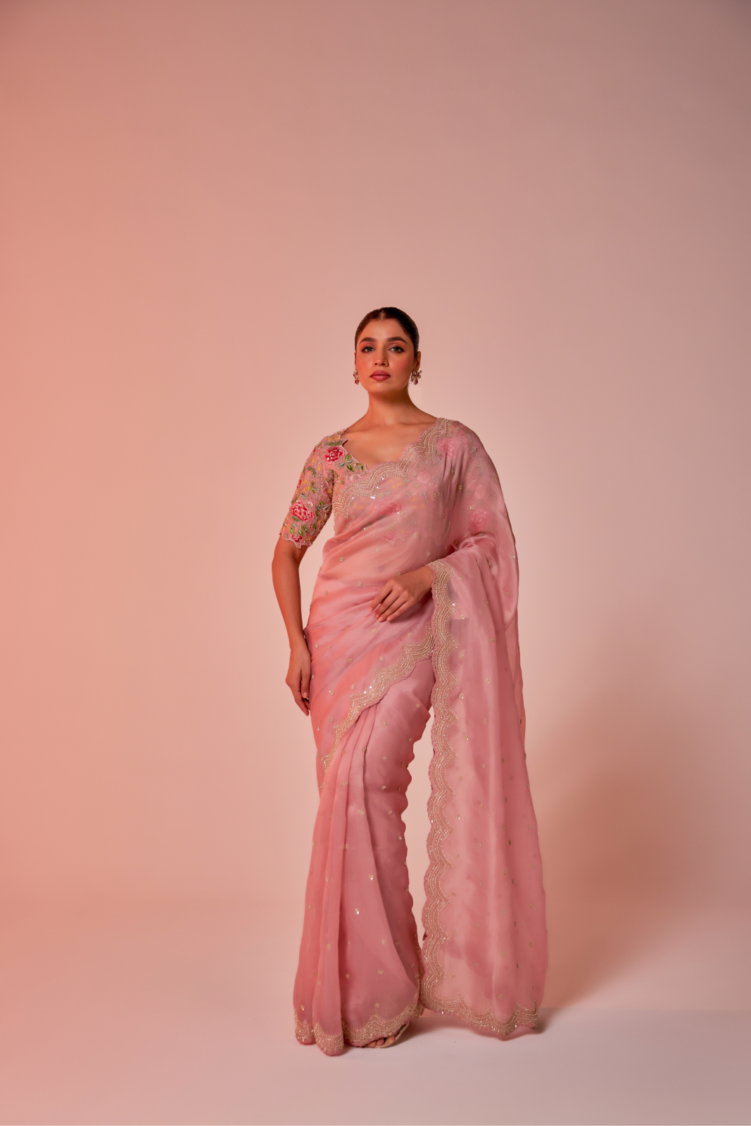 Pink silk organza embroidered Saree with multi-color elbow sleeve blouse