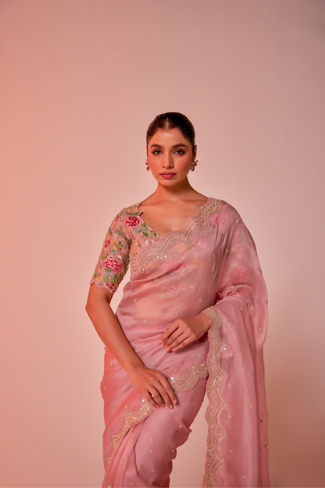 Pink silk organza embroidered Saree with multi-color elbow sleeve blouse