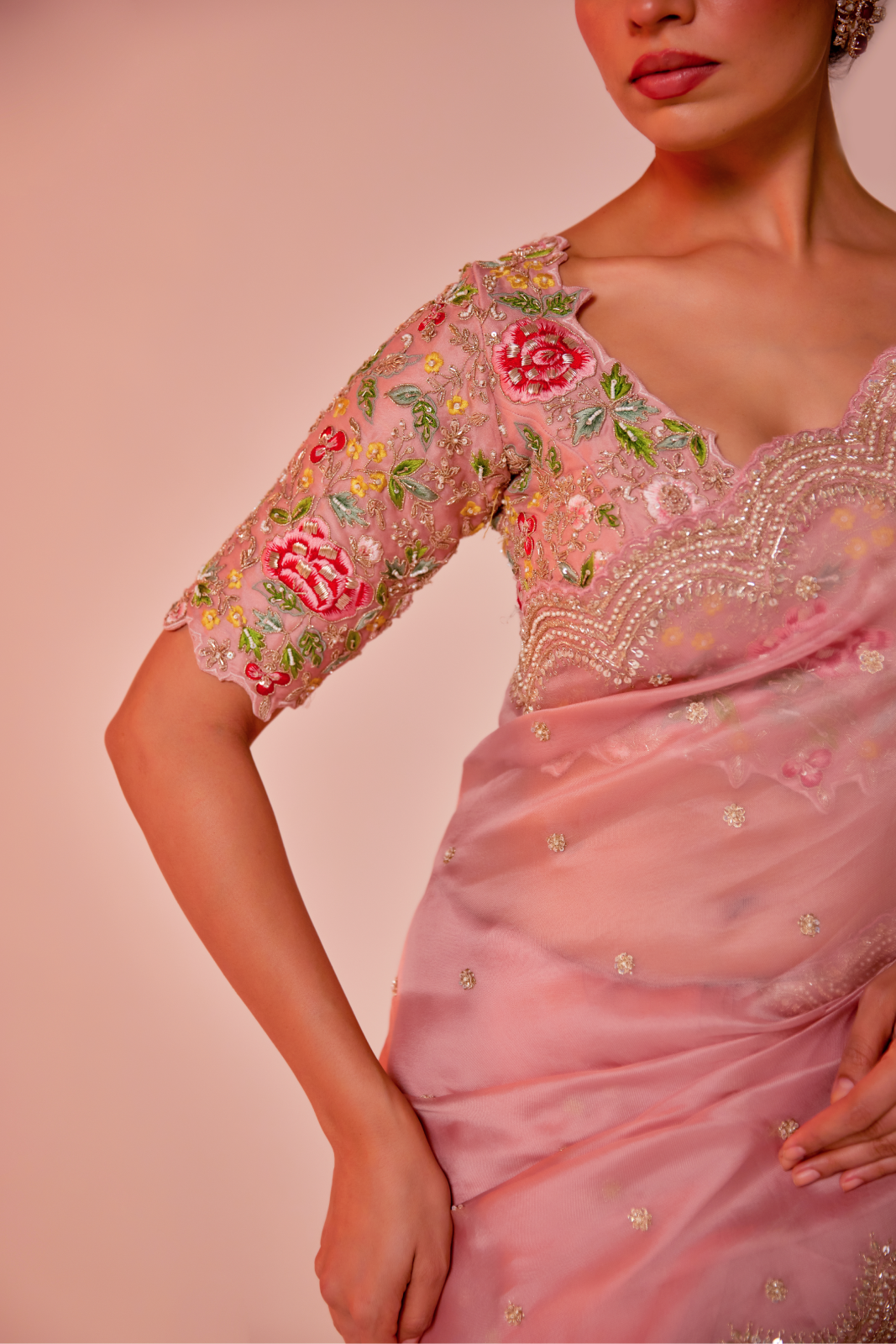 Pink silk organza embroidered Saree with multi-color elbow sleeve blouse