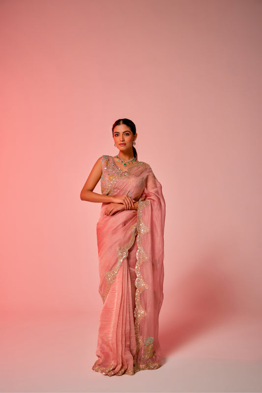 Gold hued pink crush tissue multi-color embroidered Saree with sleeveless blouse