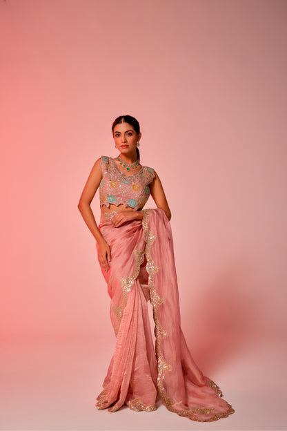 Gold hued pink crush tissue multi-color embroidered Saree with sleeveless blouse