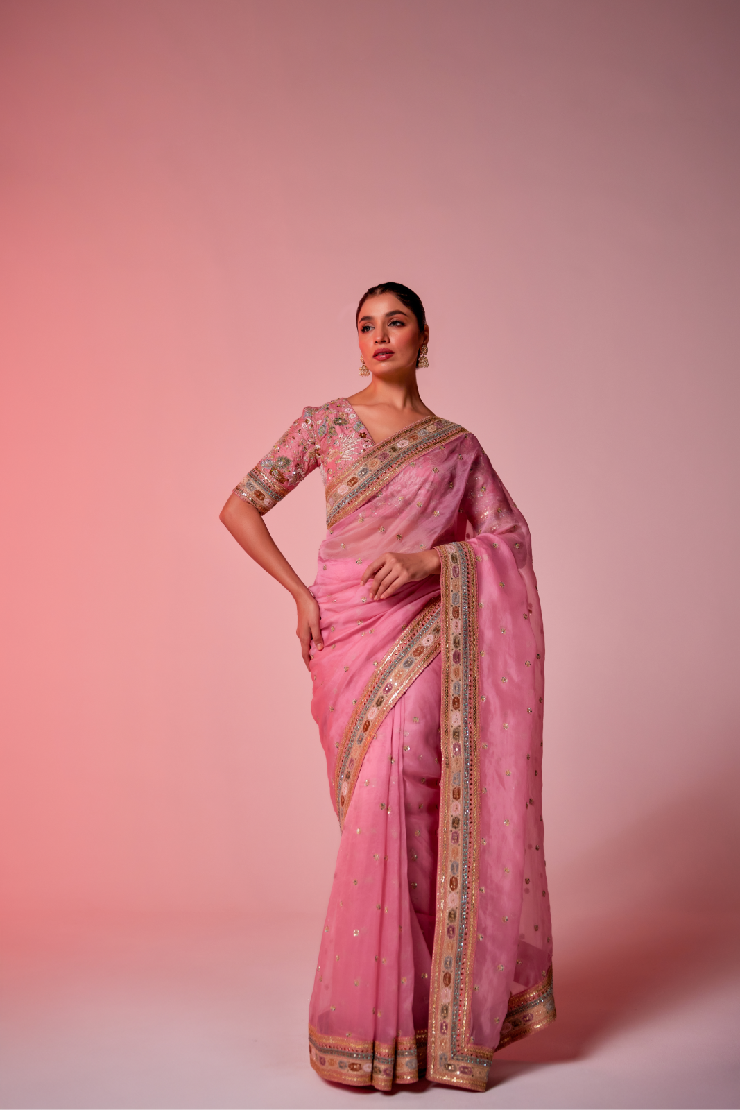 Pink silk organza multi-color embroidered Saree with elbow sleeve blouse