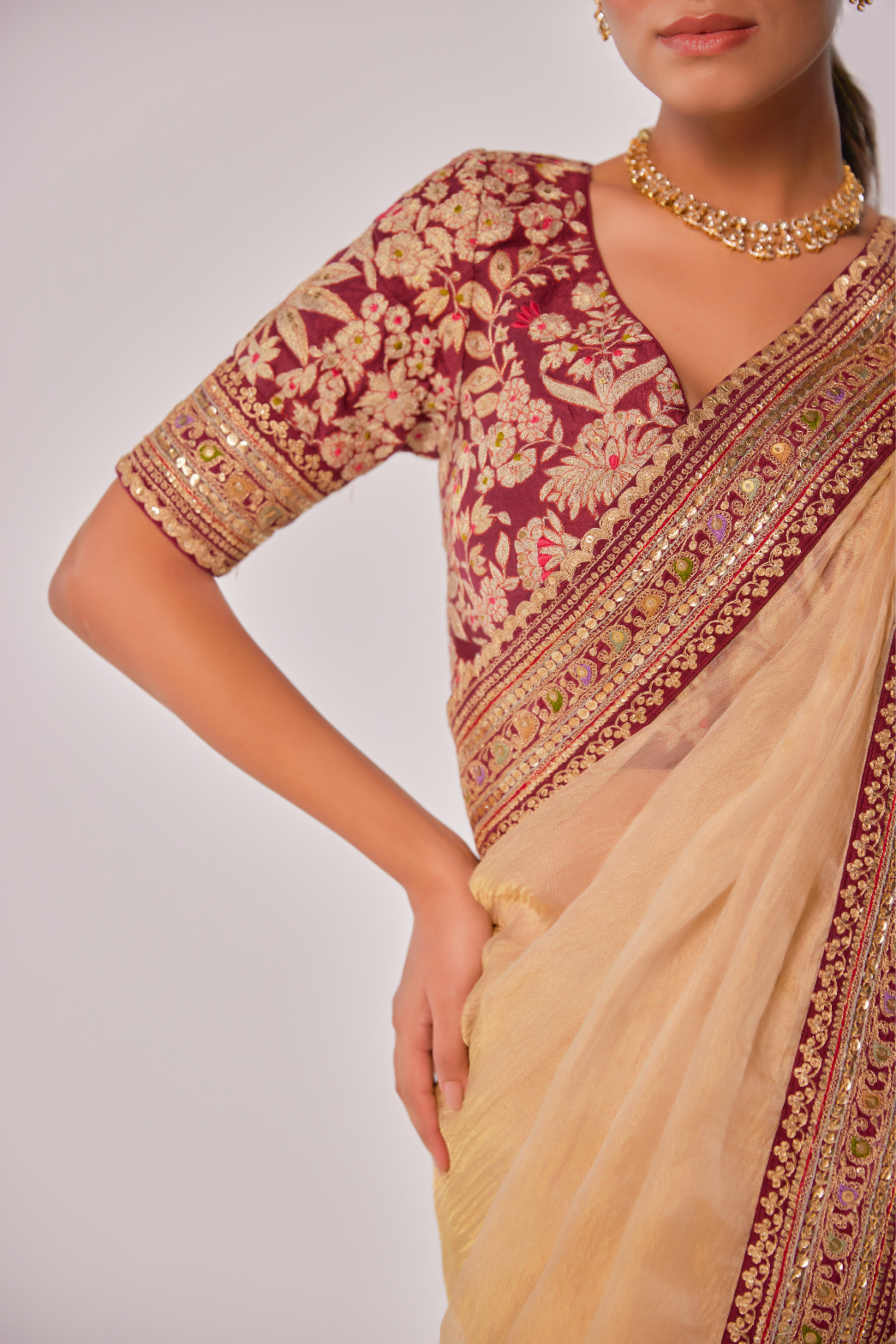 Champagne gold crush tissue embroidered Saree with elbow sleeve blouse