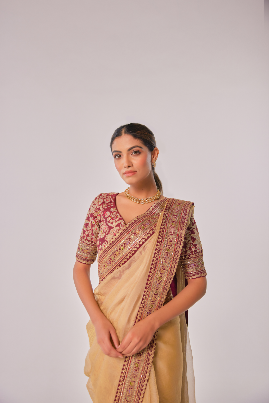 Champagne gold crush tissue embroidered Saree with elbow sleeve blouse